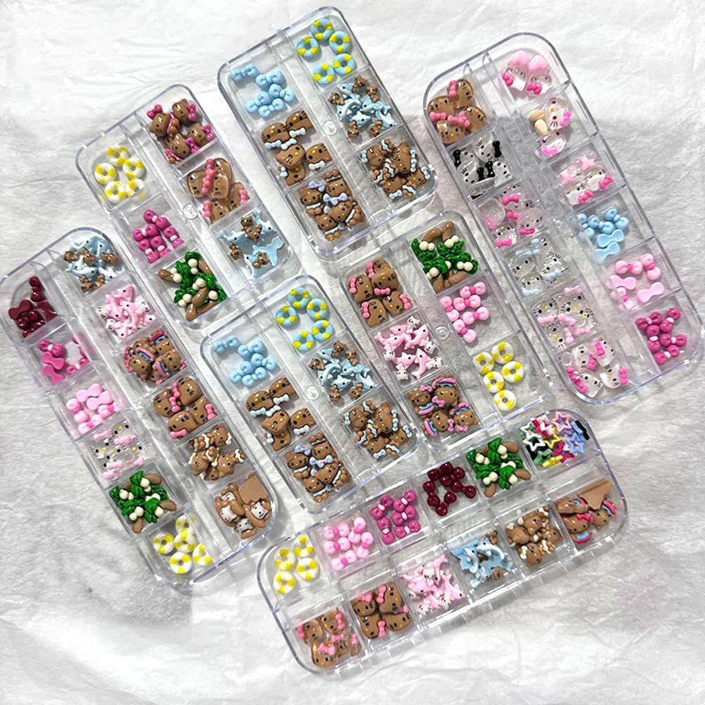 

12Grids Cartoon Tanning Kitty Nail Charms 3D Black Skin Hawaiian HelloKitty Nail Decorations y2k Bow Hello Kitty Nail Rhinestone