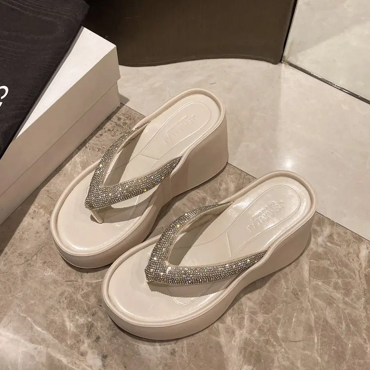 Thick soled raised herringbone slippers for women's outerwear, new 2024 summer high-end rhinestone slope heel beach sandals