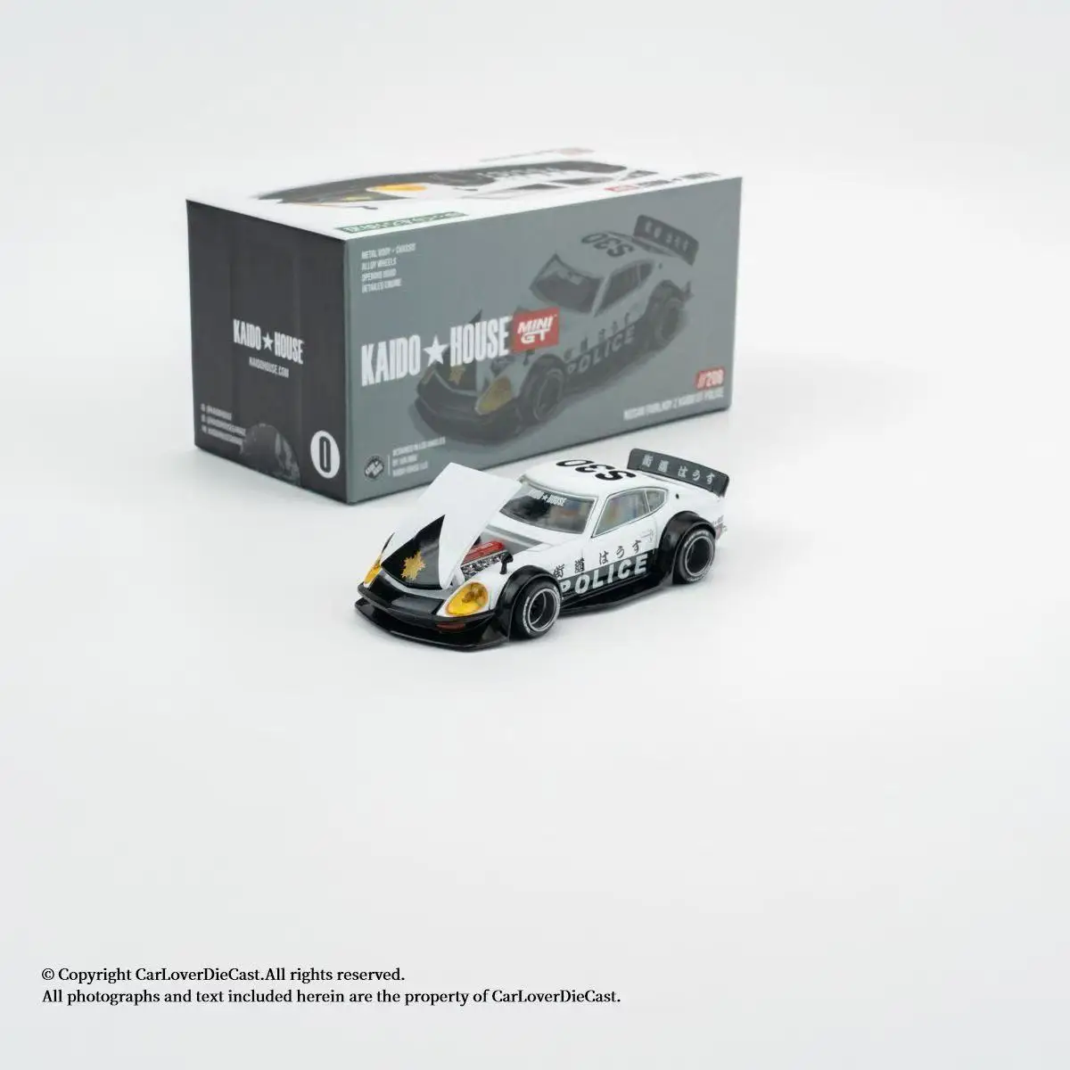 

Модель автомобиля Kaido House MINIGT 1:64 Nissan Fairlady Z GT Police Car 208 из сплава