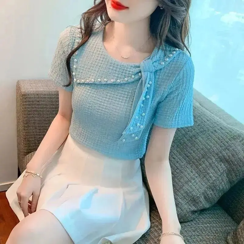 Sweet O-Neck Spliced Solid Color Lace Up Beading T-Shirts Women Clothing 2024 Summer New Loose Casual Tops Korean Tee Shirt