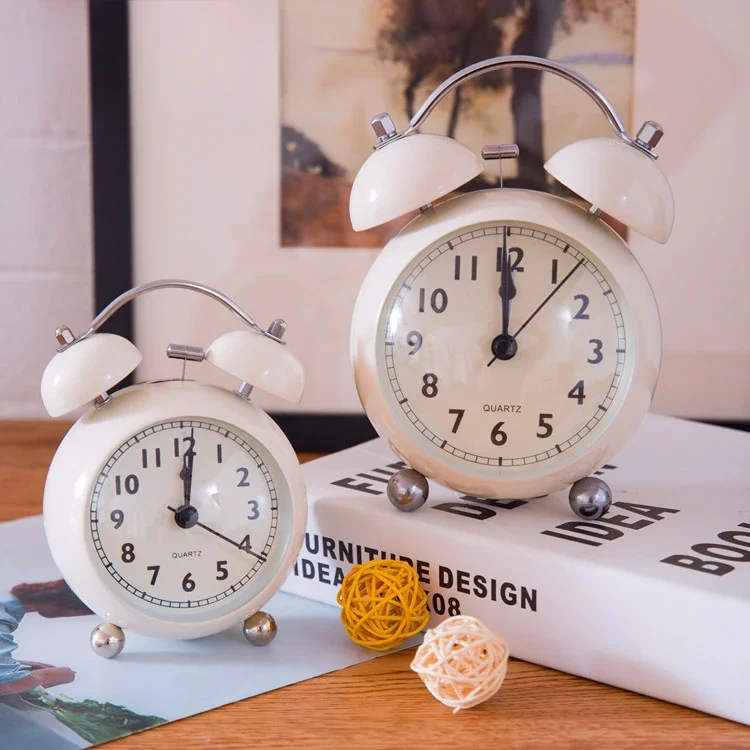 Pointer desk clock metal creative ringing alarm clock desktop silent student night light quartz seat clock