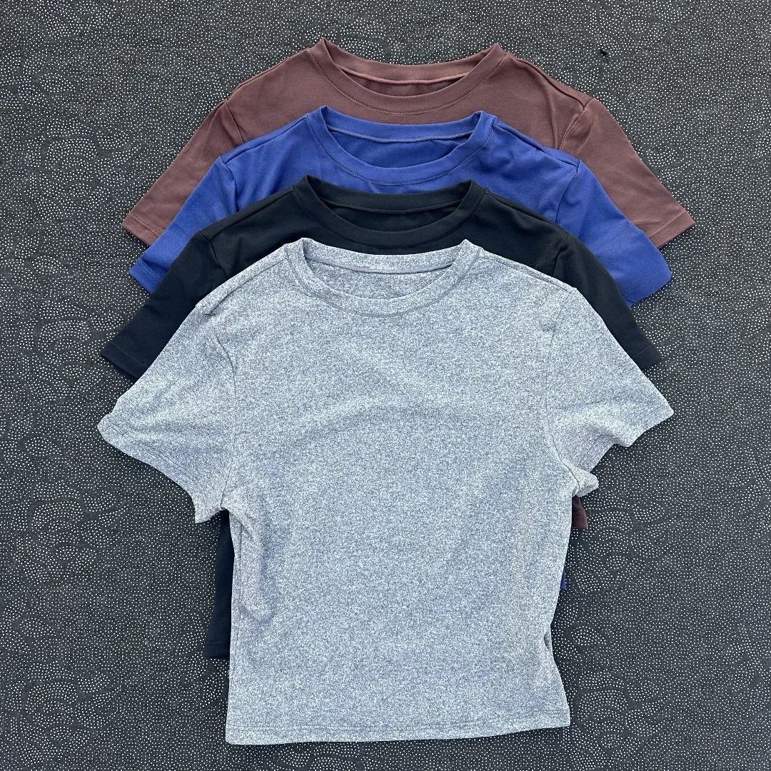 

Solid color fitness women's soft breathable yoga short-sleeved comprehensive training tight T-shirt with exposed belly button