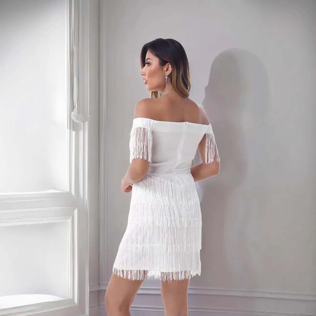 2025 Nieuwe Modieuze Backless Strakke Jurk Vrouwen Zomer Sexy En Elegante Effen Kleur One-schouder Kwastje Mini Jurken voor Vrouwen