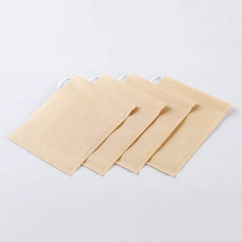 Sachets de thé en papier filtre biodégradable, sachet de thé de qualité alimentaire, écologique, avec cordon de serrage, poudre de feuille libre, passoire de phytothérapie, 100 pièces