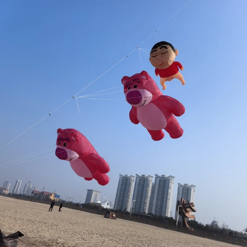 Tintenfischdrachen Anhänger fliegende Fischdrachen aufblasbare Drachen Marienkäfer weiche Drachen Nylongewebe Bärendrachen zeigen Pinguindrachen Fabrik