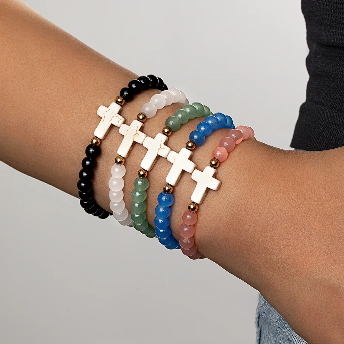 Bohemian style cross colored bead bracelet with multiple pieces of stacked women's bracelet set
