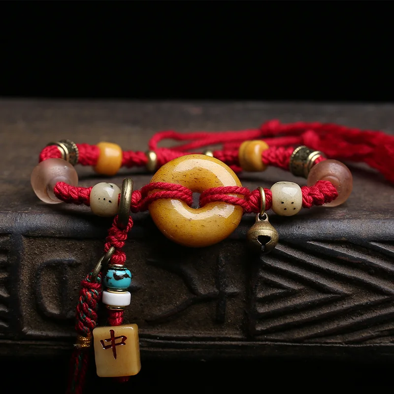 Tibetan reflux bone peace buckle bracelet ground carving dice red in glaze this year of life braided red rope bangles for women