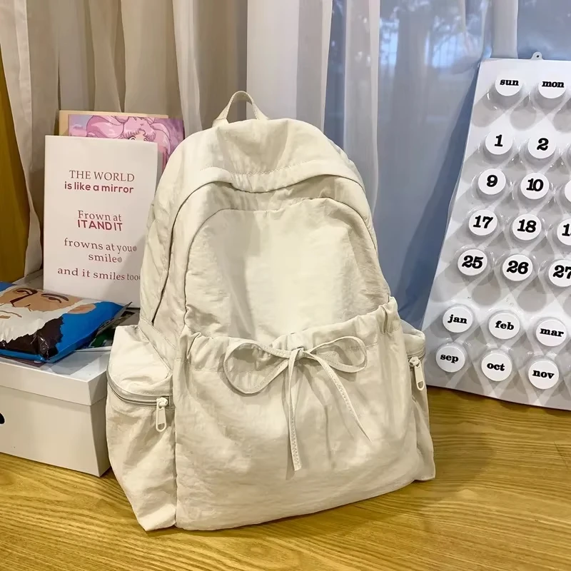 

New Student Backpack Women's Japanese Style Lightweight and Fashionable Backpack Solid Color Simple Bow Casual Travel Backpack
