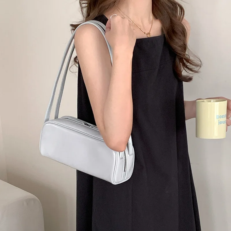 Echt lederen onderarmtas 2025, nieuwe niche-ontwerp, oliewas, koeienhuid, vintage handtas, mode, high-end damesschoudertas