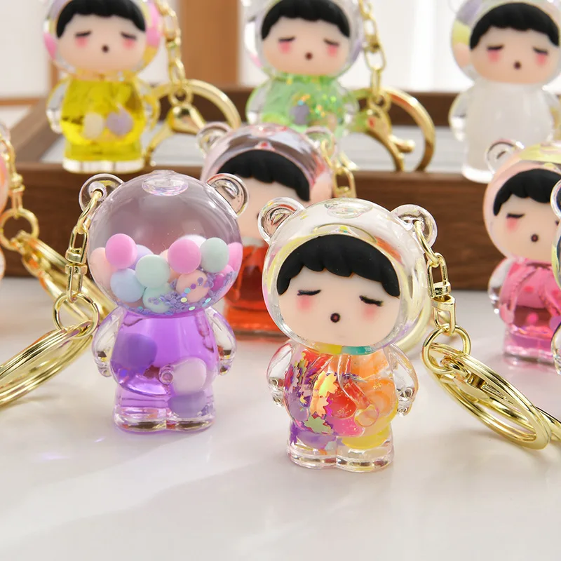 New mini cartoon keychain creative into the oil bottle series doll quicksand bottle small pendant gift ornaments