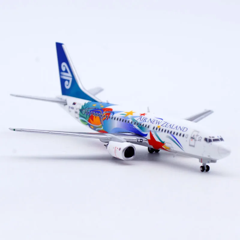 XX4969 โลหะผสมสะสมเครื่องบินของขวัญ JC Wings 1:400 Air นิวซีแลนด์ "StarAlliance" โบอิ้ง B737-300 เครื่องบิน Diecast รุ่น ZK-NGA