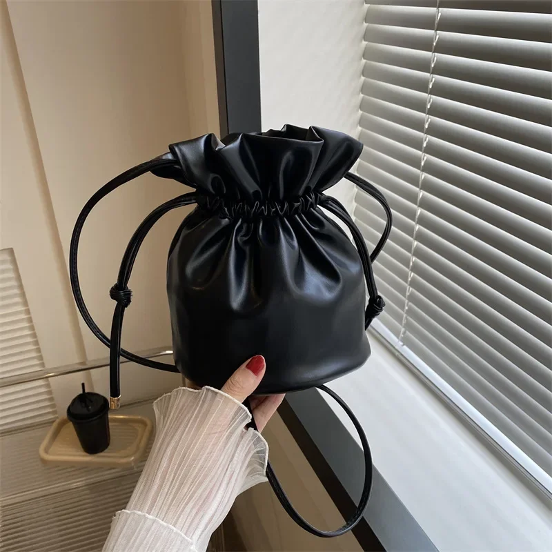 

Mini solid color soft leather shoulder messenger bag bucket bag