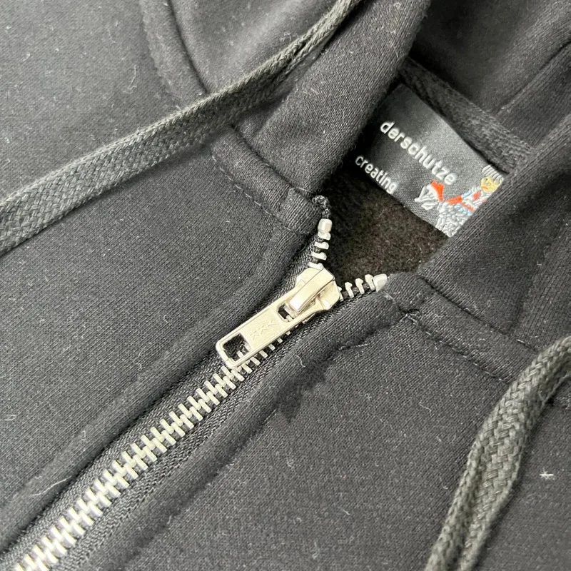 سترة صوفية بغطاء للرأس سوداء من القطن الخالص من Derschutze مطرزة بسحاب غربي كاجوال