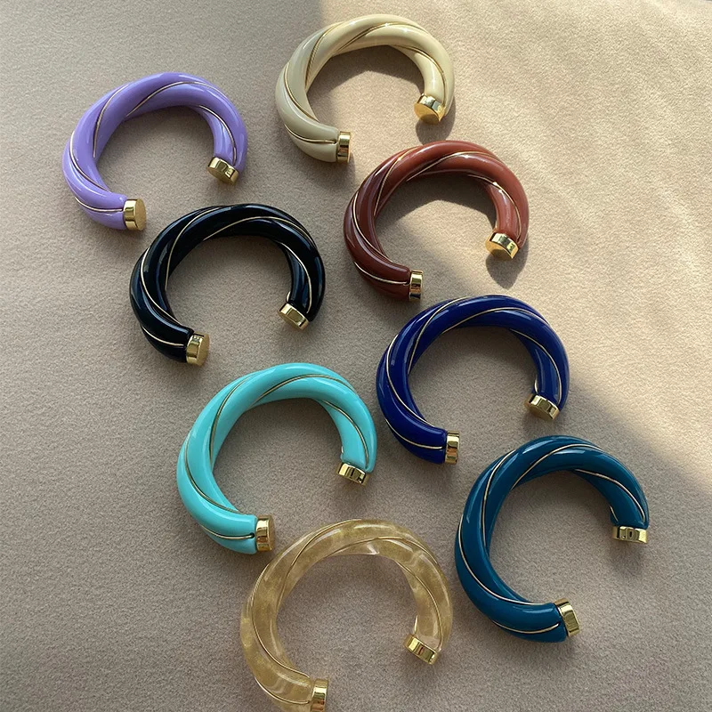 Gazing JewelryFrench niche design WOME fashion open bracelet, 585 gold dopamine gold-plated frame resin twist bracelet, high-end