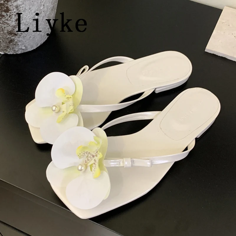 Liyke แฟชั่นฤดูร้อนออกแบบดอกไม้คลิป Toe Flip Flops ผู้หญิงแบนรองเท้าแตะกลางแจ้งรองเท้าแตะชายหาดหญิงรองเท้า Mules สไลด์