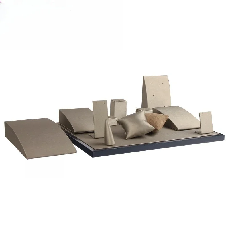 

Solid wood wrapped fabric, foreskin, necklace, ring, earring, acrylic display stand for showcase windows