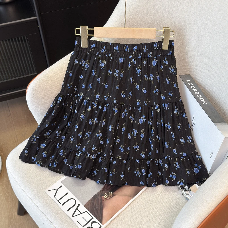 伸縮性のある韓国風レディーススカート、夏のプリントチュチュフック、花柄ルーズミディスカート、エレガントな女性用カジュアルオールマッチスカート、新作