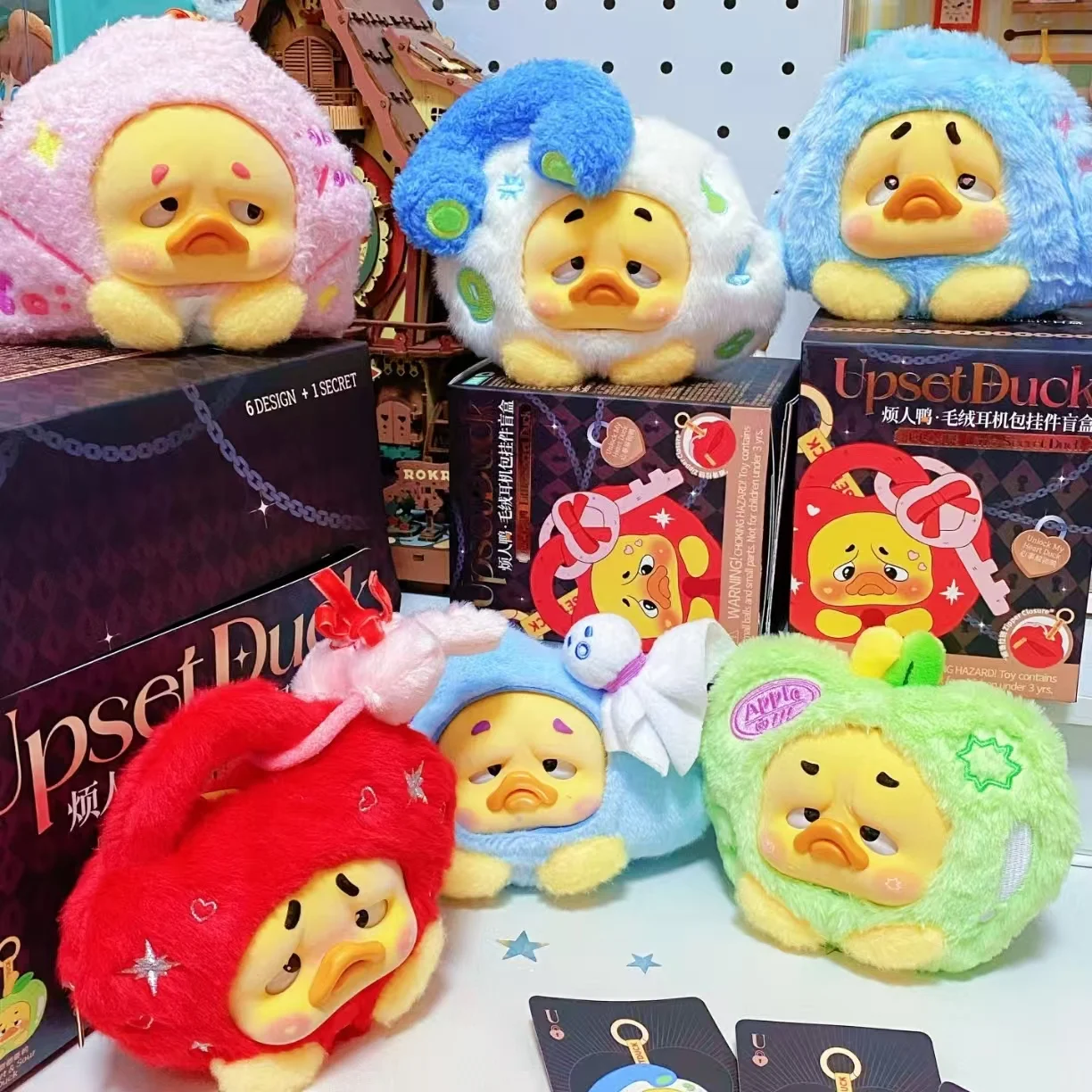 

Original 1983 Upset Duck Little Trick Duck Series Earphone Case Keychain Blind Box Cute Doll Bag Pendant For Fans Collector Toy