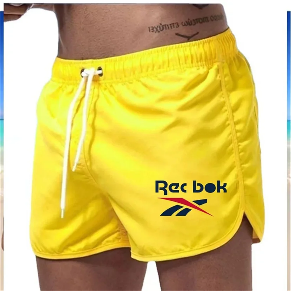 Summer fashion casual breathable quick drying ultra-thin best-selling beach shorts Men\'s swimming shorts + men\'s sports gym spor