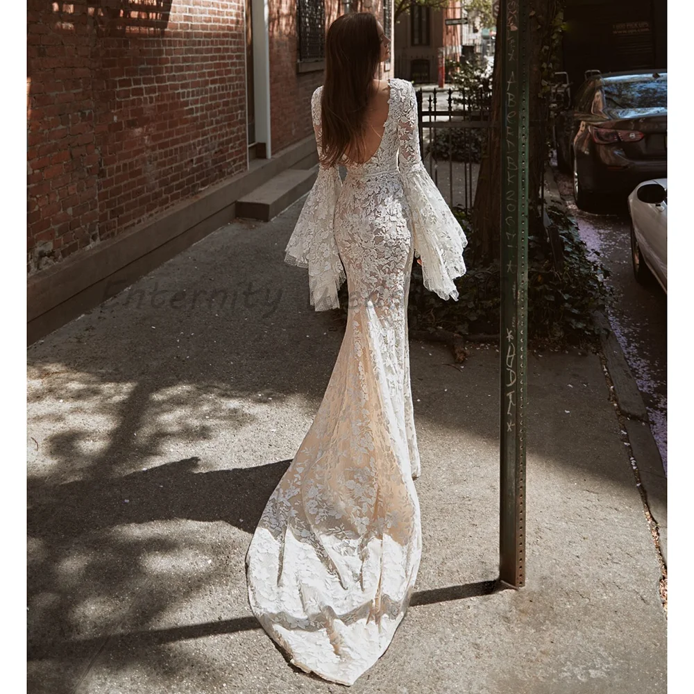 Boat Neck Bell Long Sleeve Lace Mermaid Wedding Dress Sheer Low Back Champagne Floral Lace Appliques Bridal Gown With Train