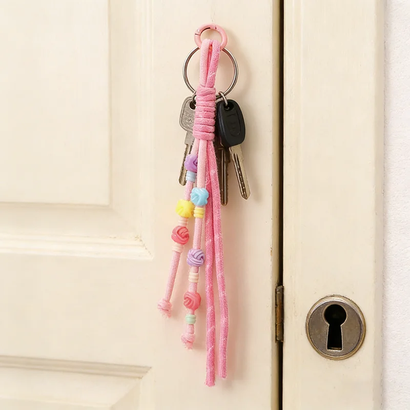 Handgefertigter gewebter Dopamin-Quasten-Schlüsselanhänger, Unisex, süßer Taschenanhänger, hängende Ornamente, 4 Farben, Seil, für Paare und Freunde, Schmuckstück
