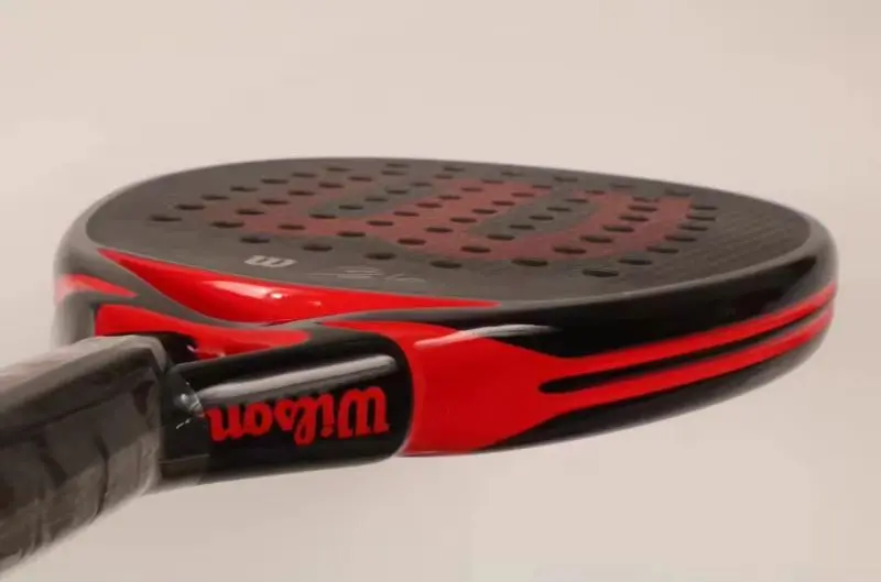 مضارب التنس الاحترافية من ويلسون على شكل ألماس من ألياف الكربون مع مضارب تنس باديل أساسية من إسفنج إيفا ميموري فليكس
