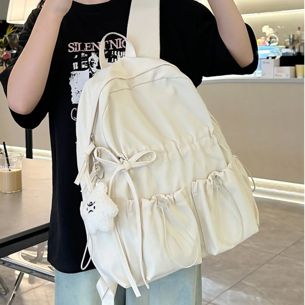 ใหม่กันน้ําเด็กโรงเรียนกระเป๋าเป้สะพายหลังไนลอนความจุขนาดใหญ่นักเรียนกระเป๋านักเรียนน้ําหนักเบากวดวิชากระเป๋าโรงเรียนสํานักงาน