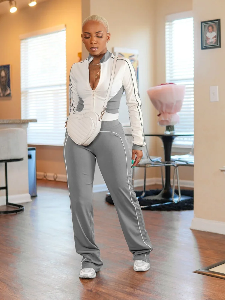 

Три сестры, новые поступления, весенне-осенний модный спортивный белый топ на молнии с длинными рукавами, комплект из двух предметов, брючные костюмы