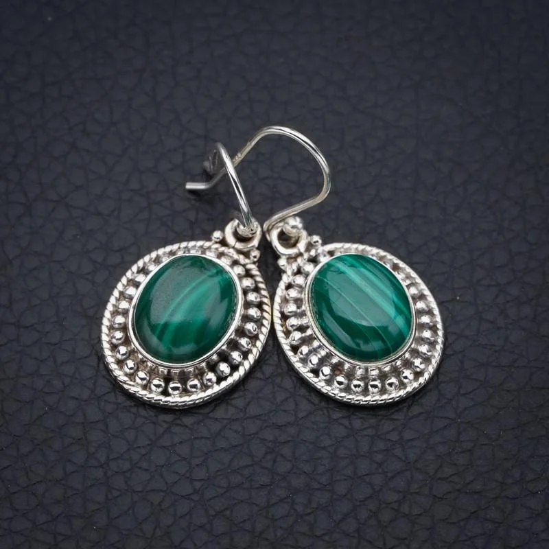 

Серебряные серьги ручной работы из Малахита StarGems 1,25 "F5632