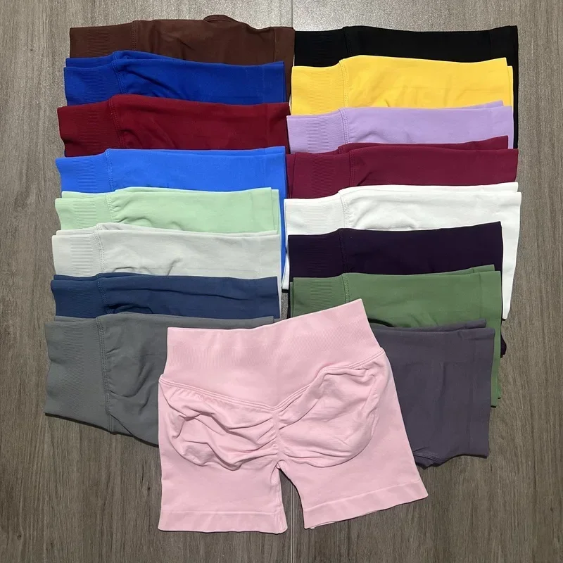 DyfneImpact شورت مع شعار 4.5 ''منخفضة الخصر سلس اليوغا السراويل Scrunch بوم الصالة الرياضية السراويل تجريب السائق قصيرة تمتد اللياقة البدنية Sho