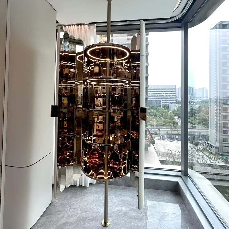 

Creative light luxury designer brass wine cabinet, high-end pillar bullet display cabinet in villa luxury hotel