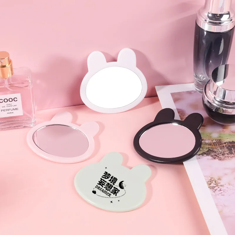 مرآة مكياج على شكل رأس أرنب مبتكرة لطيفة صغيرة محمولة باللون الوردي والأخضر والأبيض والأسود