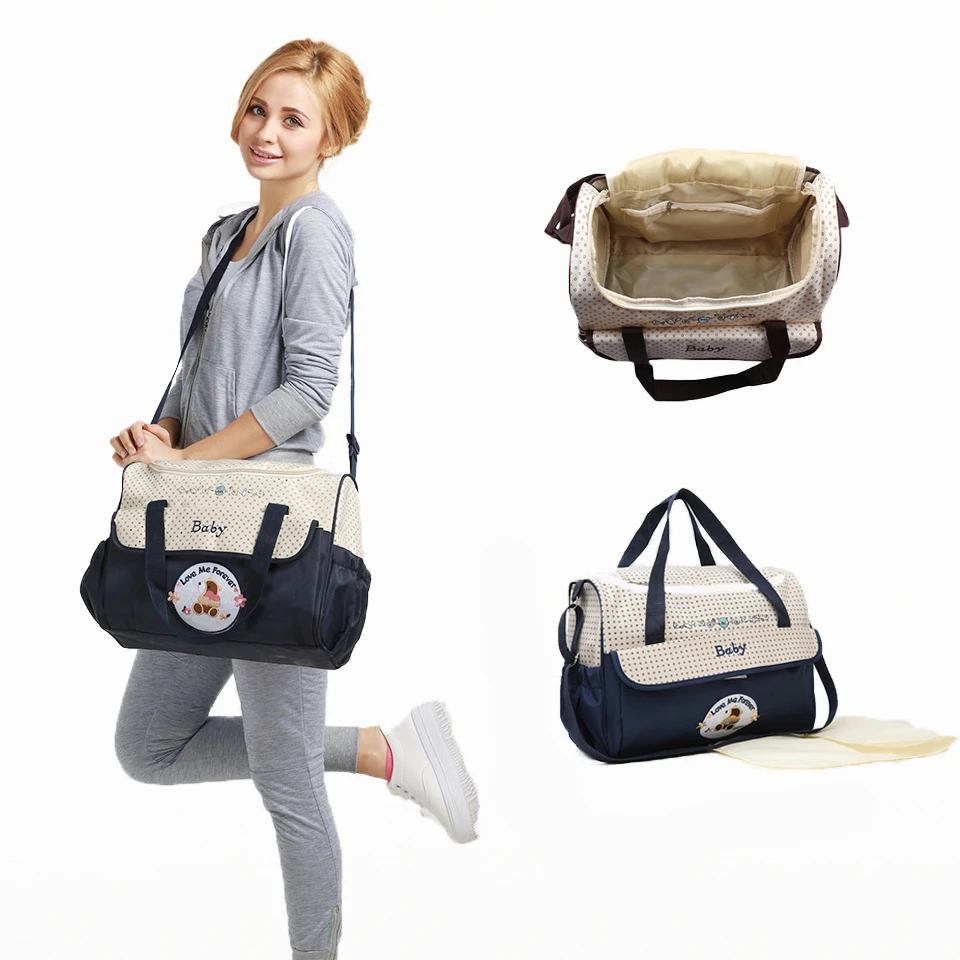 

New Outgoing Fashion Embroidered High end One Shoulder Mommy Bag Multi functional Large Capacity Handheld Diagonal Diaper Bag