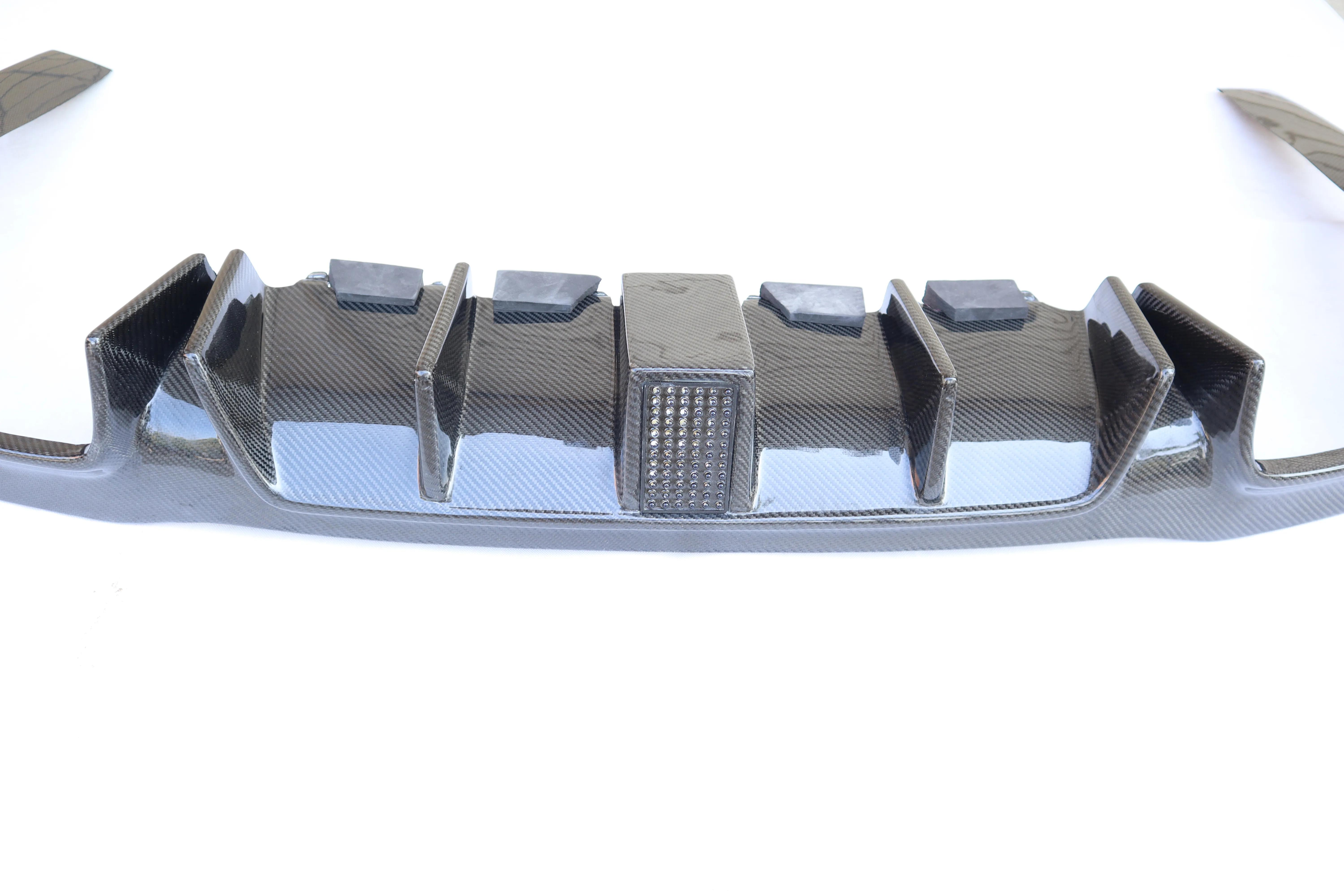 

W213 E63/E63S Carbon Fiber Diffuser – High Gloss Black Finish, Perfect Accessory