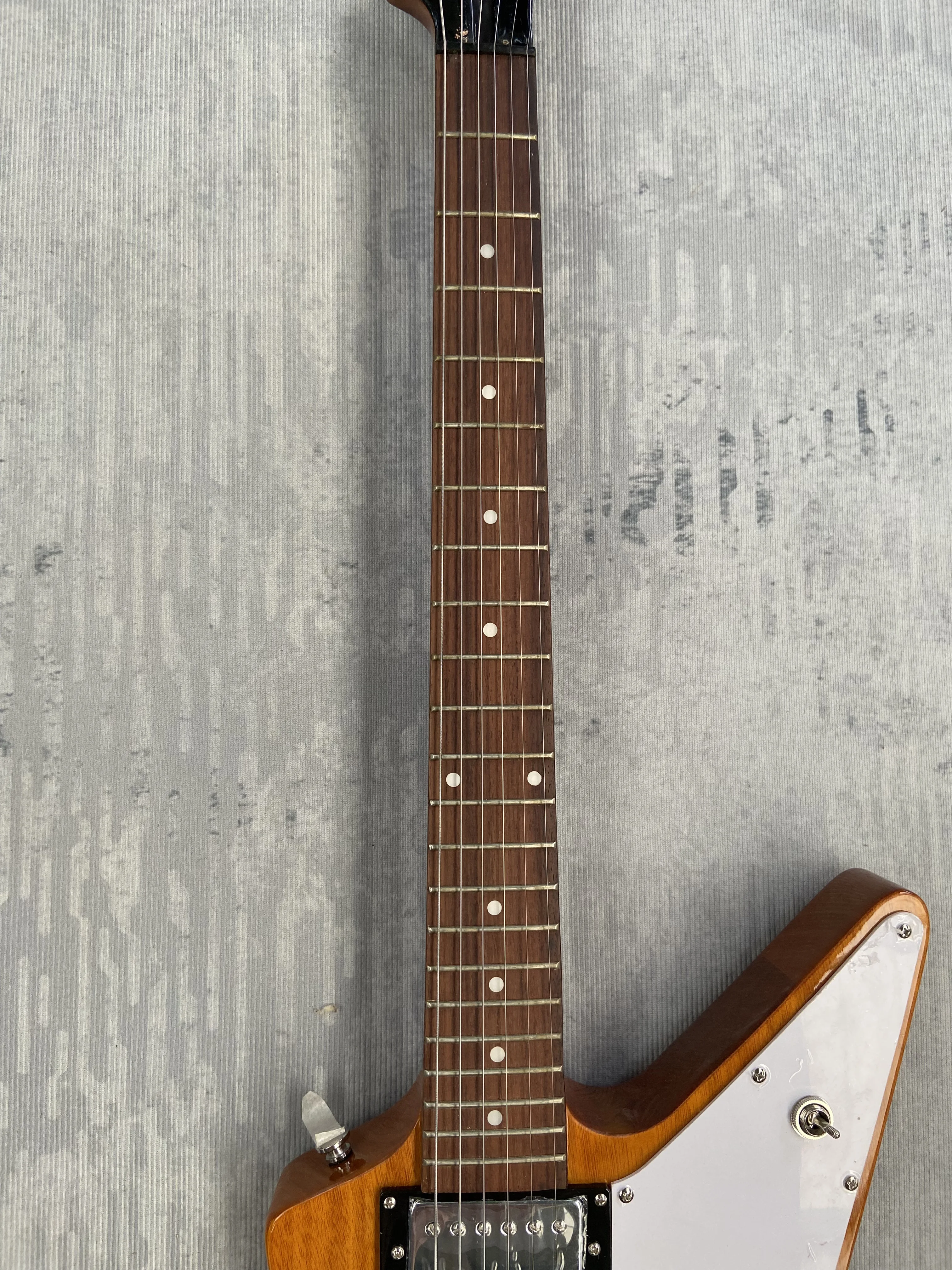 NEW! Electric guitar made in China wood color, have logo! A mahogany body. In stock, G12