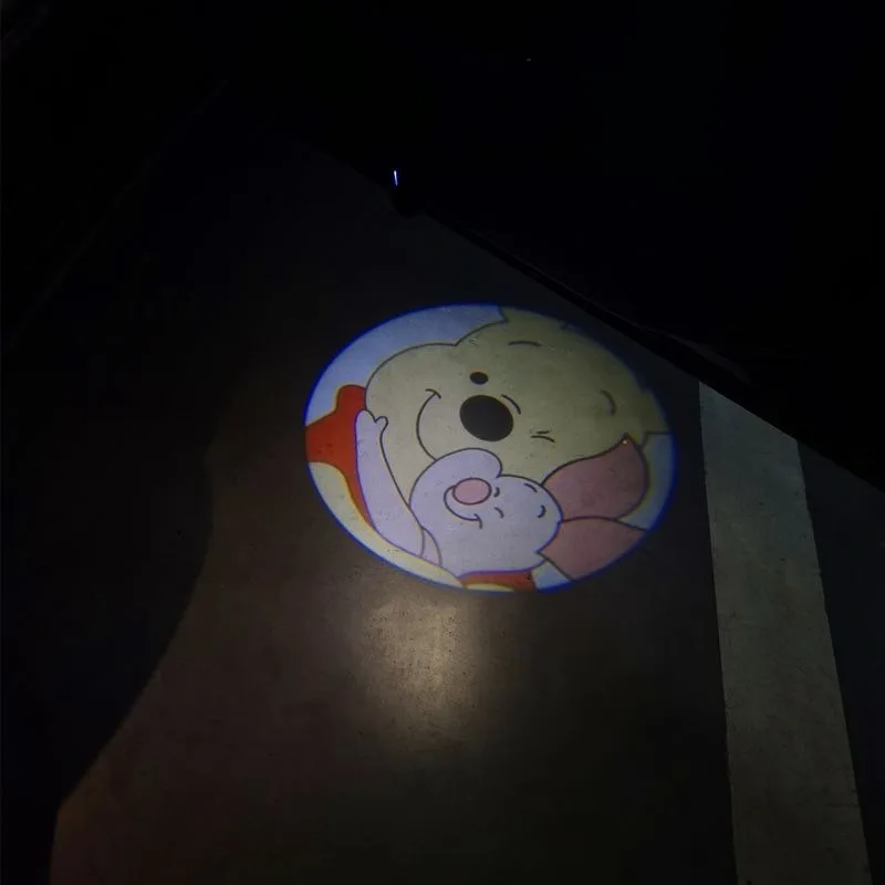 Winnie the Pooh Cartoon Animation Car Wireless Welcome Lamp Fashion Personalized Car HD Induction Projector Lamp Car Decoration