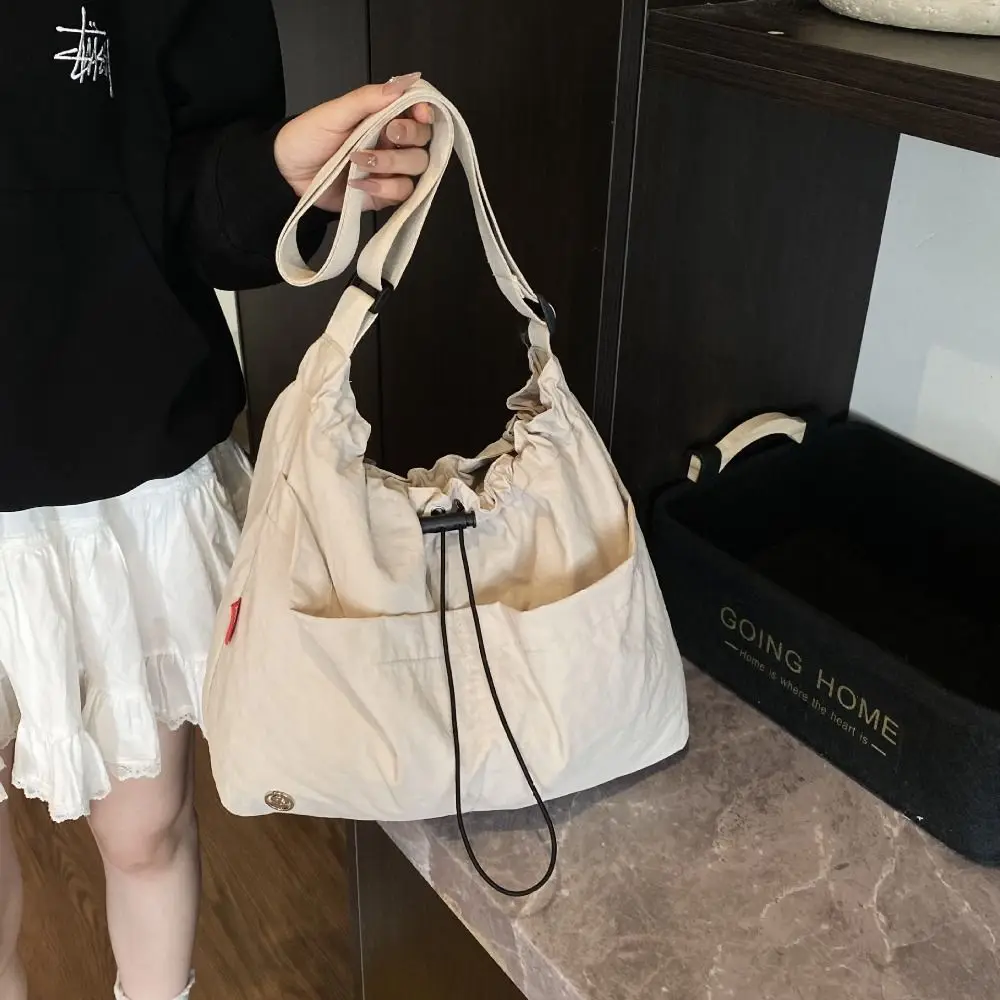 

Korean Style Pleated Drawstring Bucket Bag Large Capacity Solid Color Nylon Shoulder Bag Waterproof Handbag Cloth Crossbody Bag