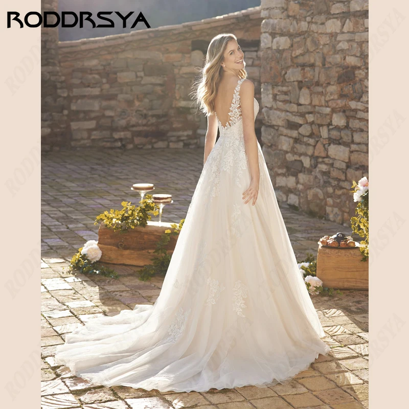 RODDRSYA sexy V-hals mouwloze trouwjurken kant Appliques Tulle Bride Party rugloze A-lijn bruidsjurken Vestids De Novia sexy V-hals mouwloze trouwjurken kant Appliques Tulle Bride Party rugloze A-lijn bruidsjurken Vest