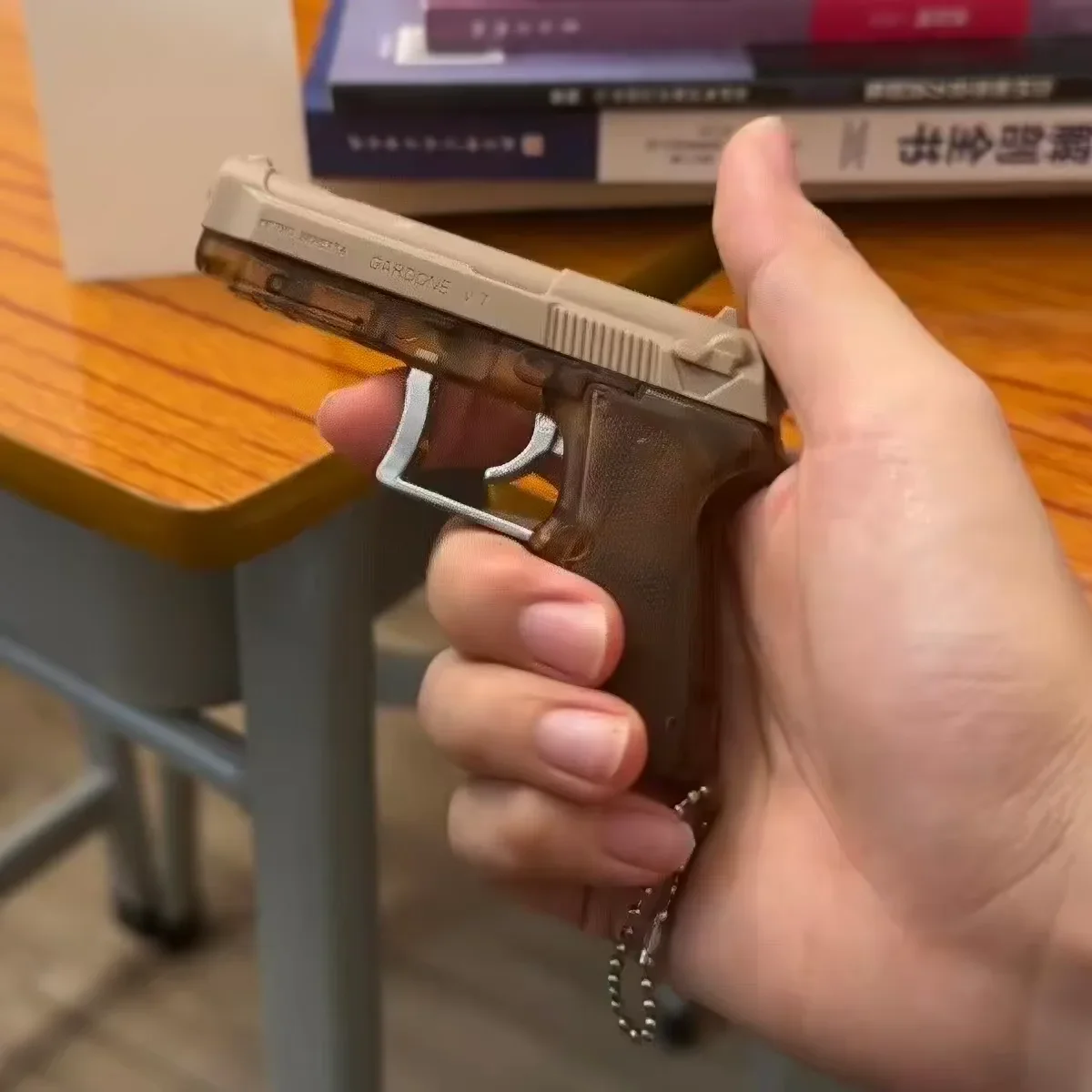 Novelty Shock Prank Toy Gun Keychain Portable Gag Joke Gadget Harmless Trick Toy For Party Prank Fun Surprise Birthday Gift