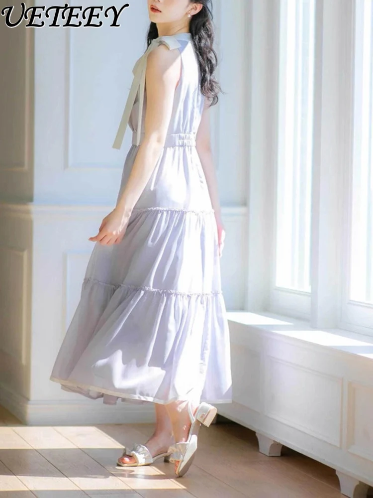 Lente en zomer nieuwe zoete stijl halter hals ronde hals hoge taille afslankjurk mode stip vlinderdas lange jurken