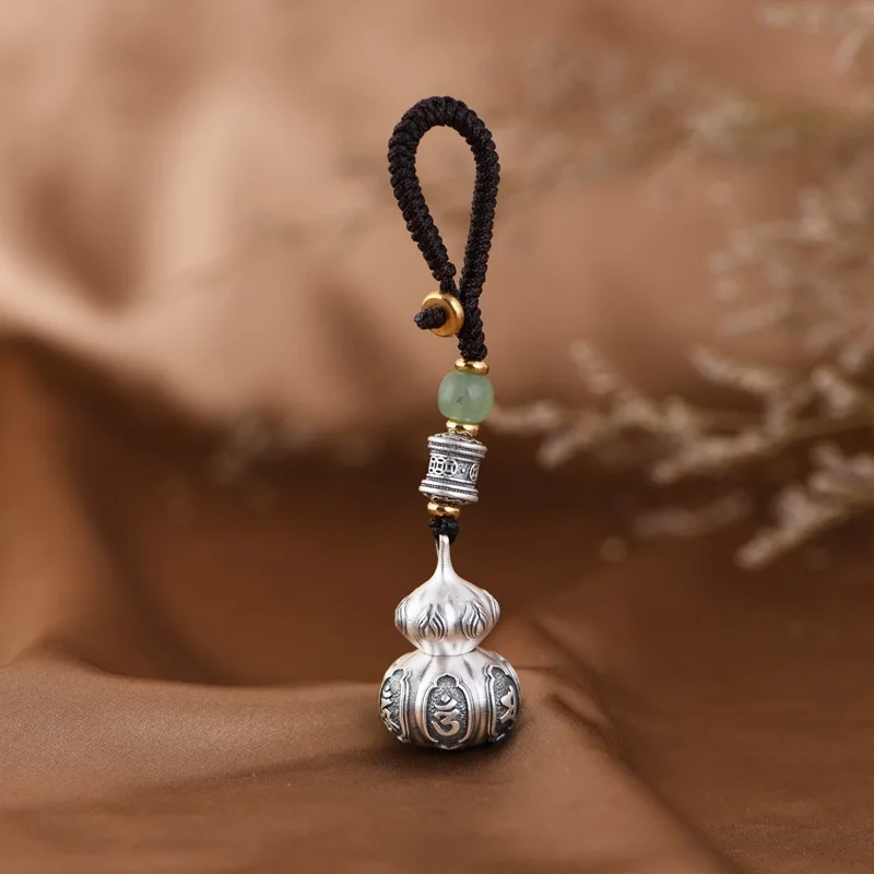 

Retro vintage craftsmanship can be used to open and store silver gourd car keychains with text