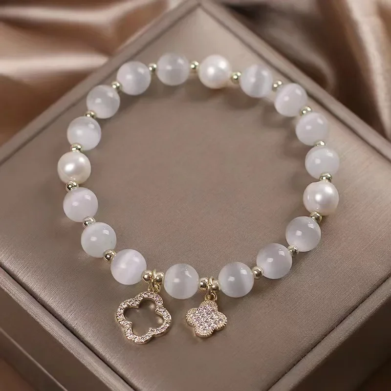 Women's Lucky Four-Leaf Flower Crystal Bracelet Elastic Rope Pearl Transfer Bead Hand Chain Jewelry Bangles Gift