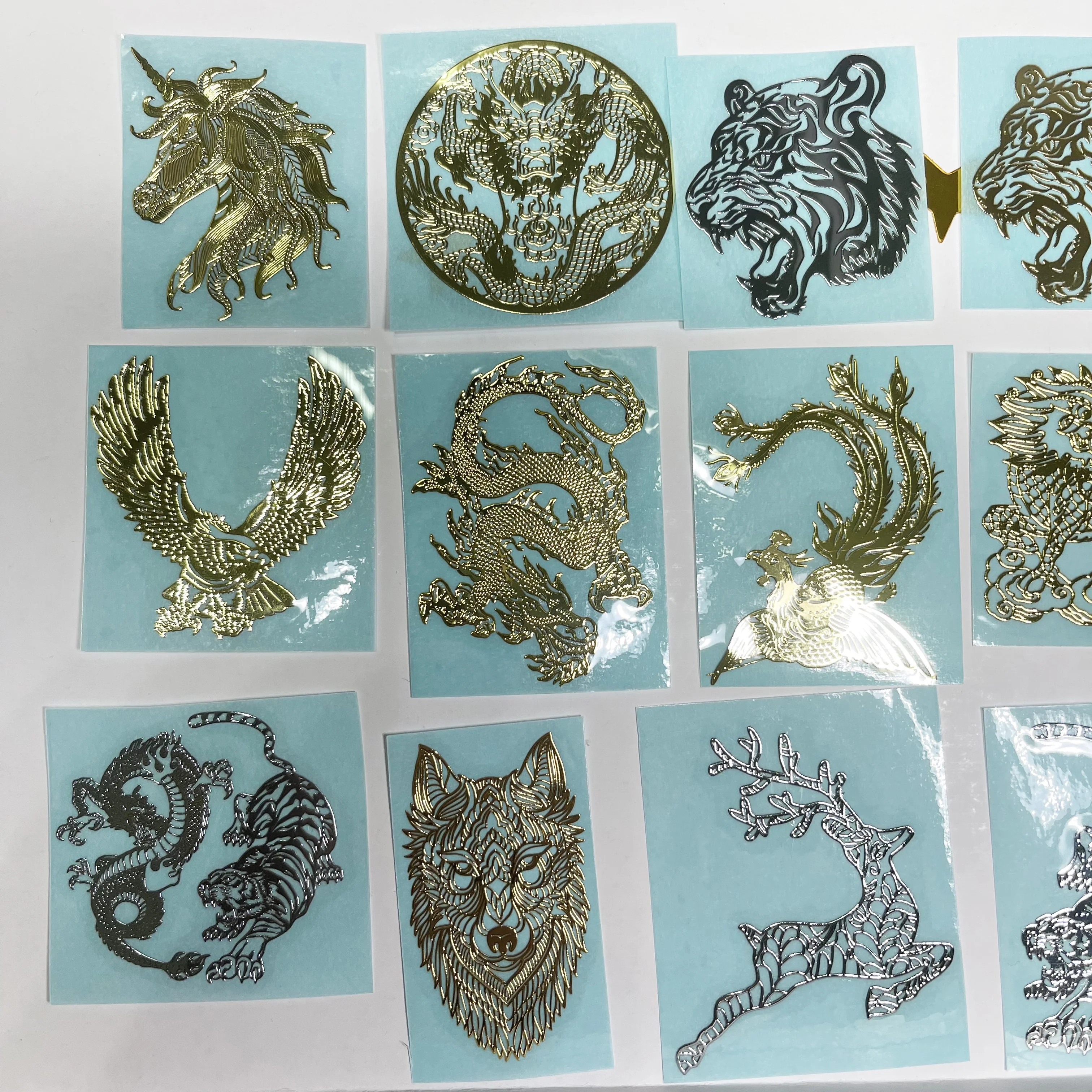 Spot personality dragon tiger phoenix unicorn pixiu koi wolf eagle computer mobile phone metal sticker metal hollow sticker