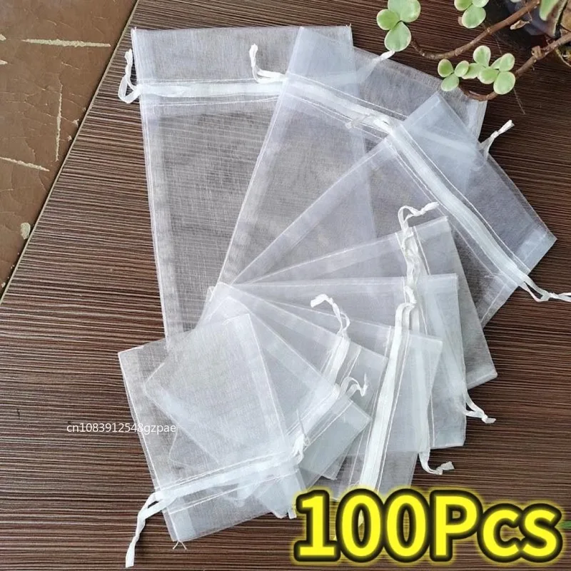 50/100 Uds. Bolsas de Organza blancas con cordón 7x9 9x12 10x15 15x20 20x30cm bolsas de embalaje para regalos de joyería para fiesta y boda bolsas