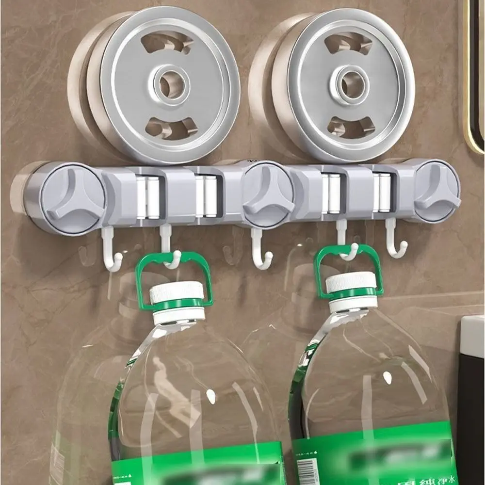 

4 Position Suction Cup Mop Holder 5 Hooks Strong Fixed Mop Hanging Rack with Hook Space Saving Suction Wall Mount Bracket