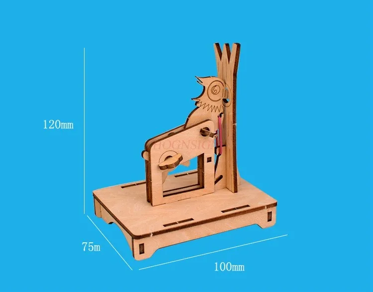 Science experiment student works woodpecker handmade DIY production of children's technology gizmos assembled model toys