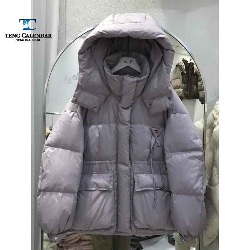 Chaqueta de plumón corta a la moda para mujer, plumón de pato blanco suelto grueso con capucha, chaqueta de pan caliente, nuevo estilo de invierno,