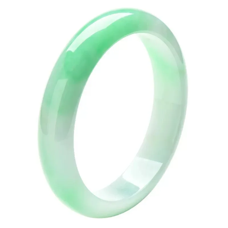 ice-like, waxy texture, with a light green hue and delicate floral patterns; a jade bracelet made of jadeite