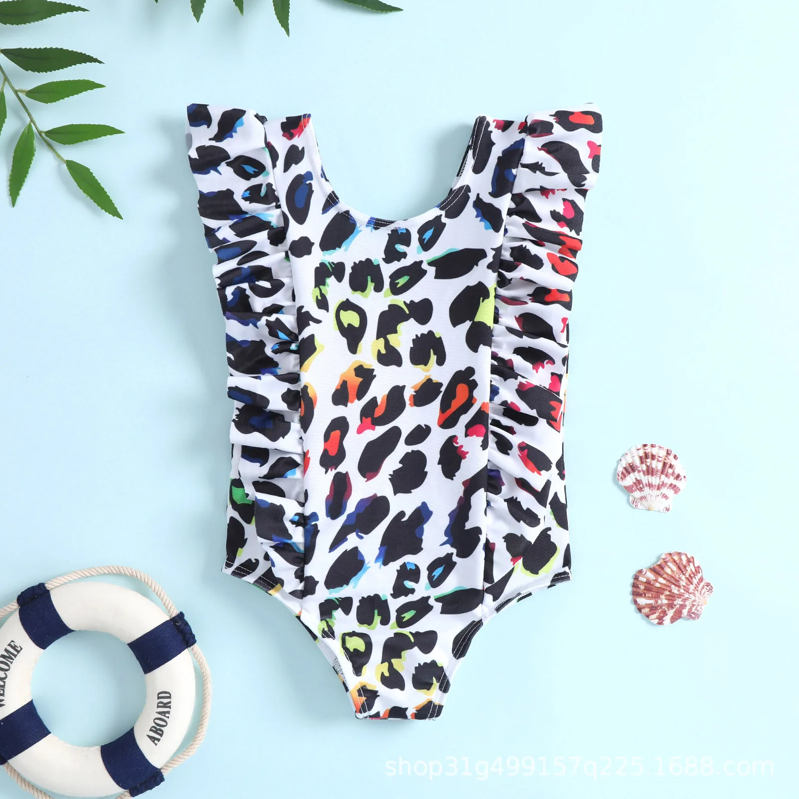 Toddler one piece swimsuit with ruffle decor and colorful leopard print for pool and beach play