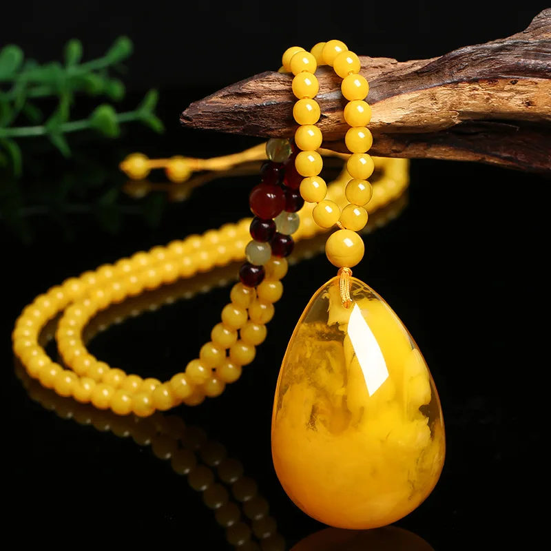 Golden drop , second-generation old honey necklace, amber wax chicken fat yellow pendant, long sweater chain for me
